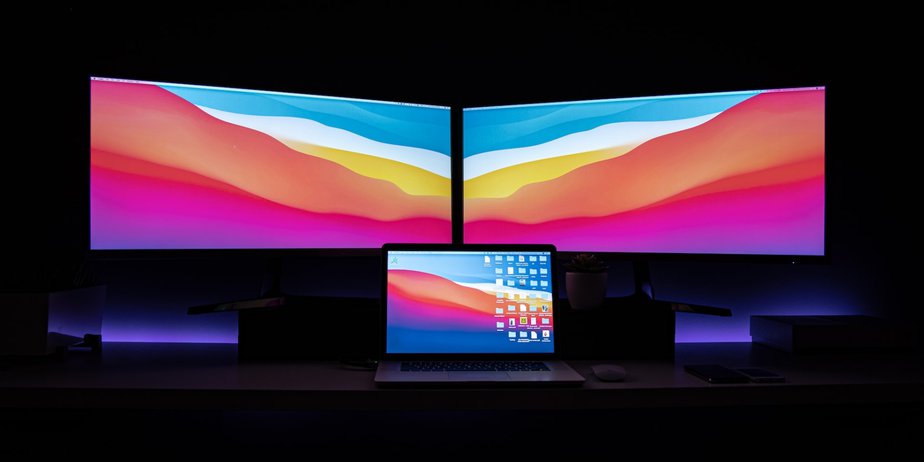 laptop and dual monitor setup image