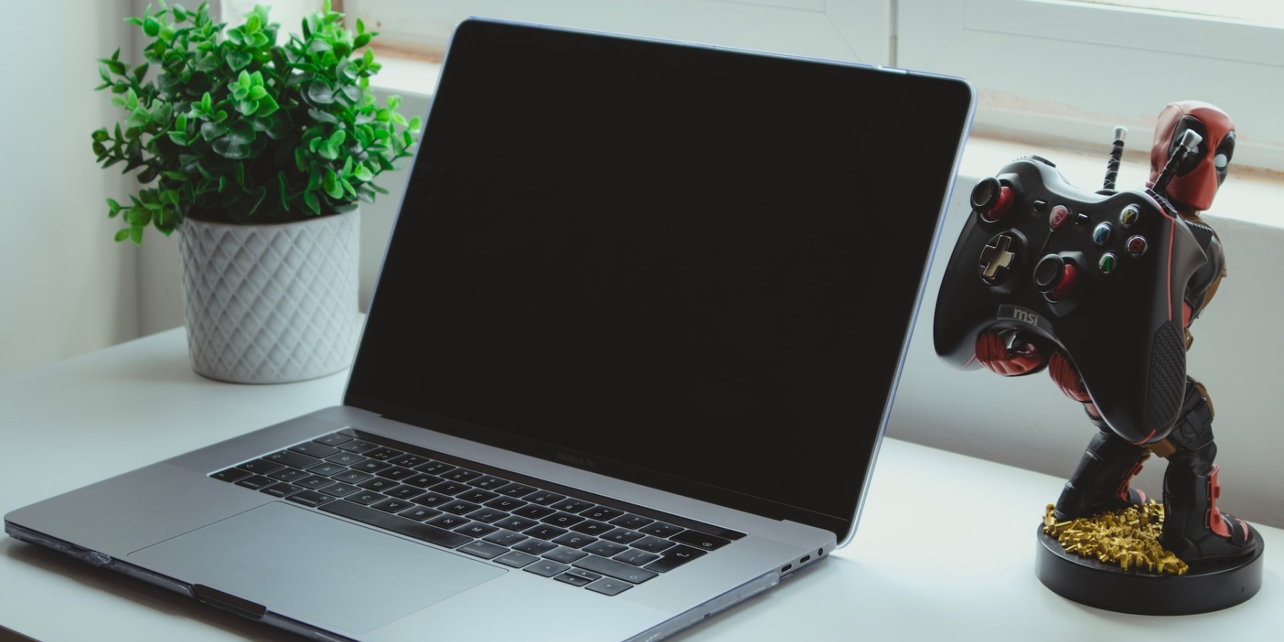 Laptop with deadpool image