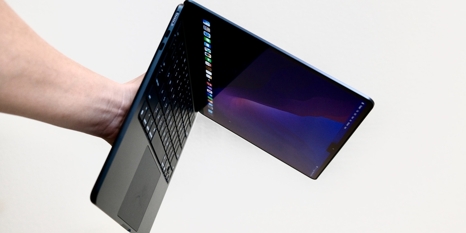 Laptop on hand image