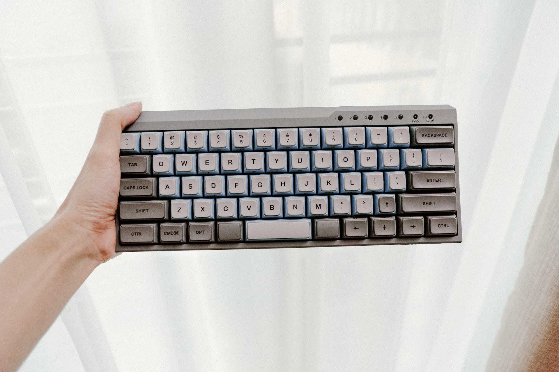 Mechanical keyboard with its owner's hand