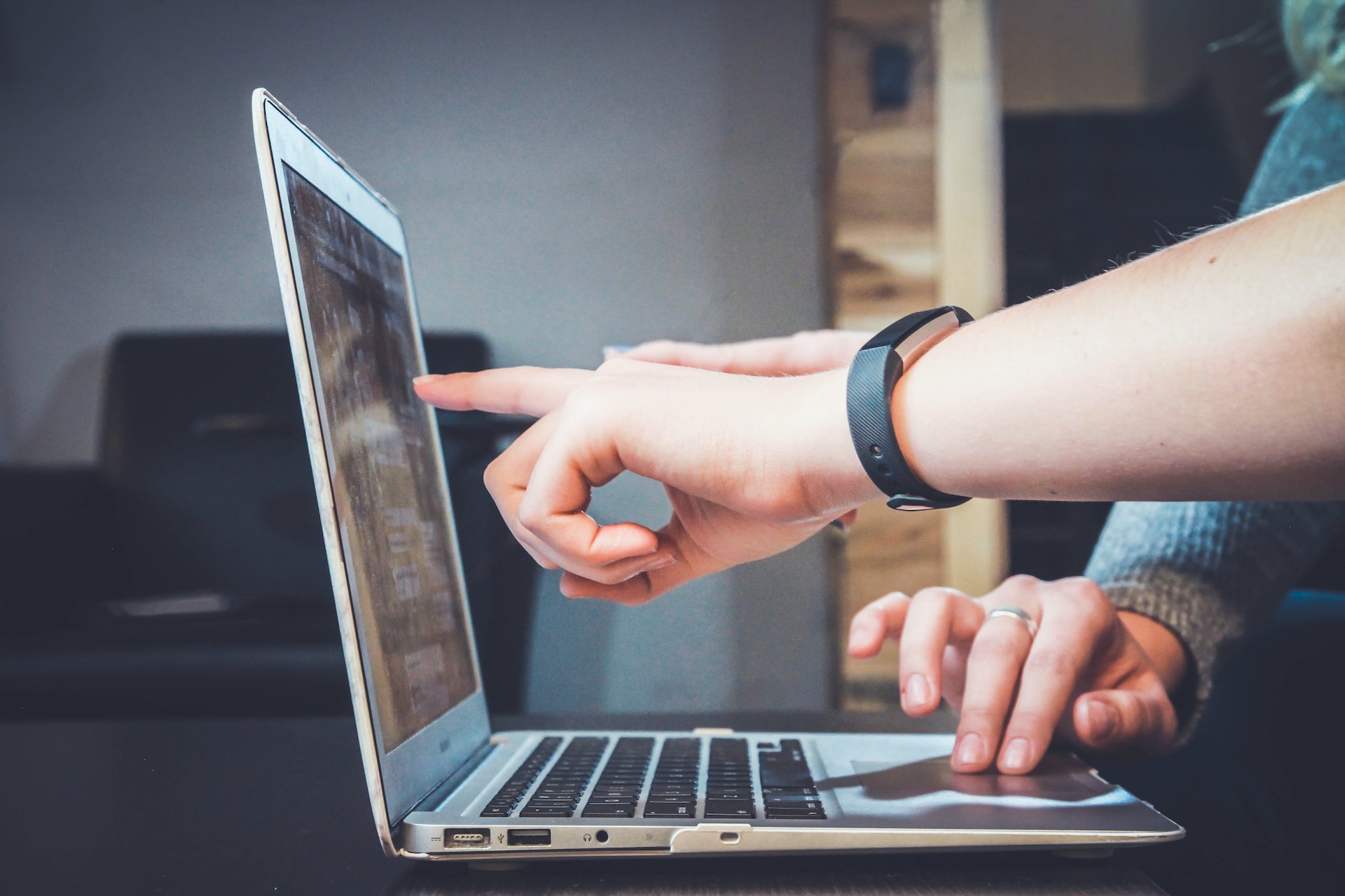 Pointing at a laptop