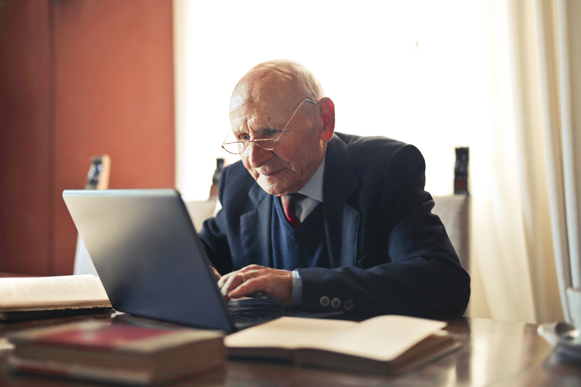 old person and his laptop